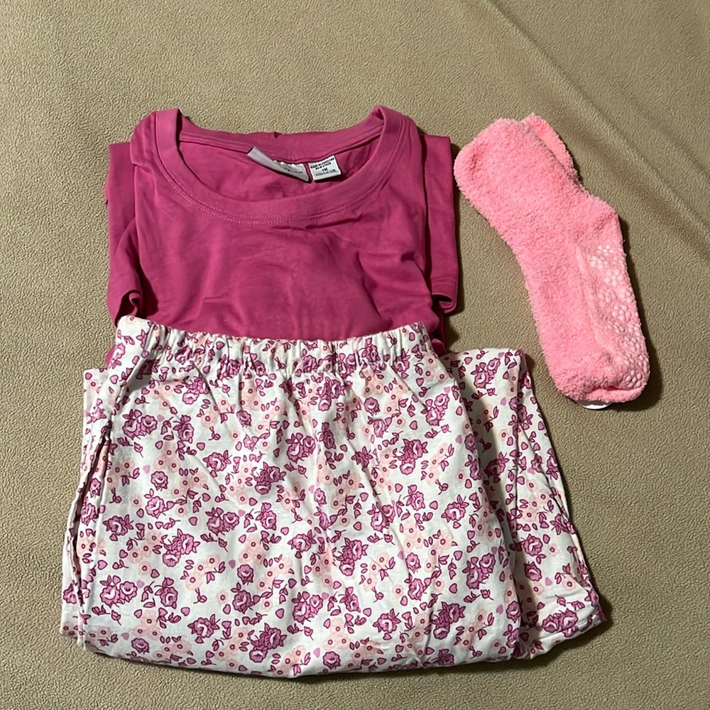 Two piece pajama set plus non-skid slipper socks. Size 1 X. New without tags.